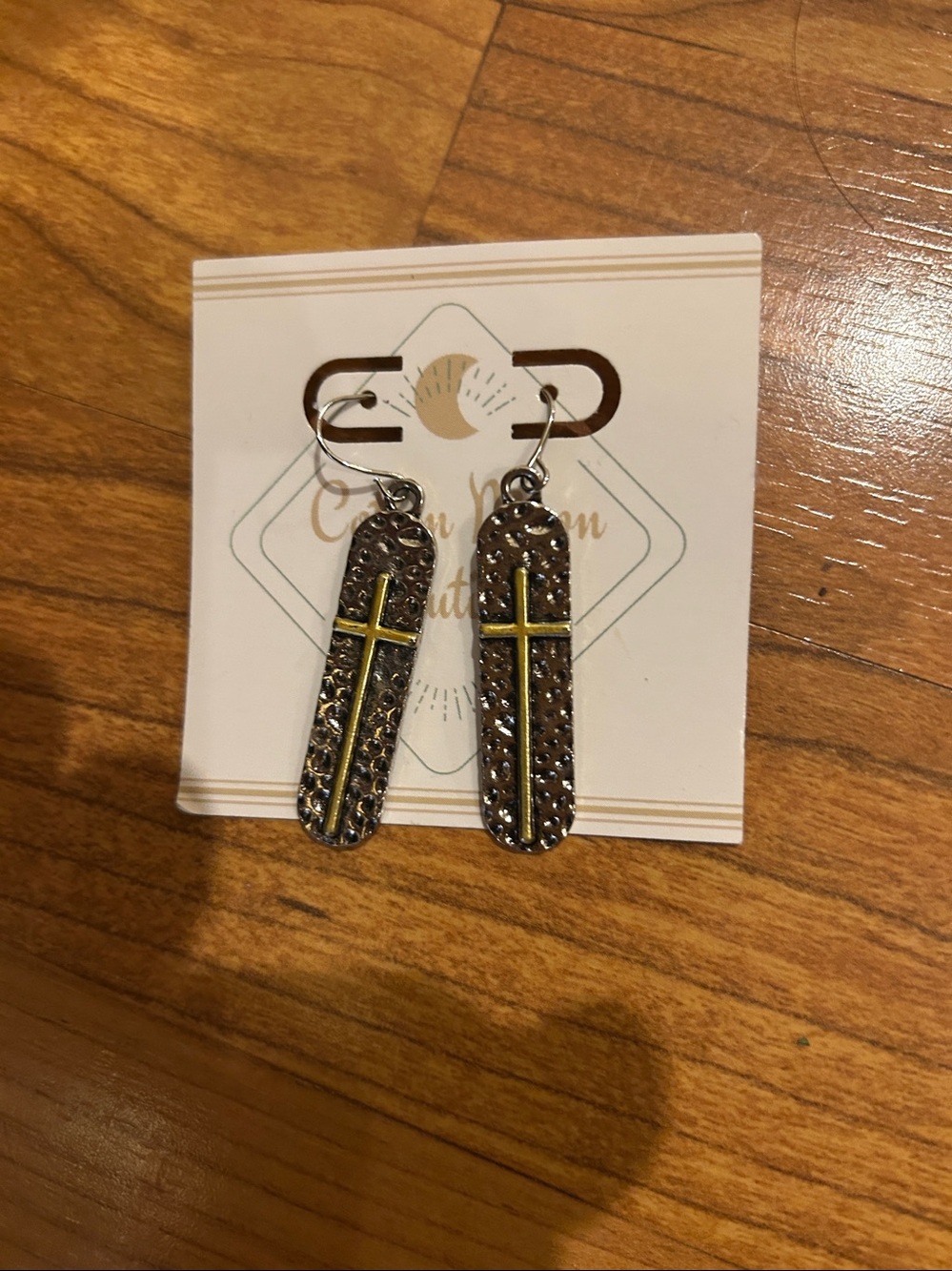 cross dangle earrings